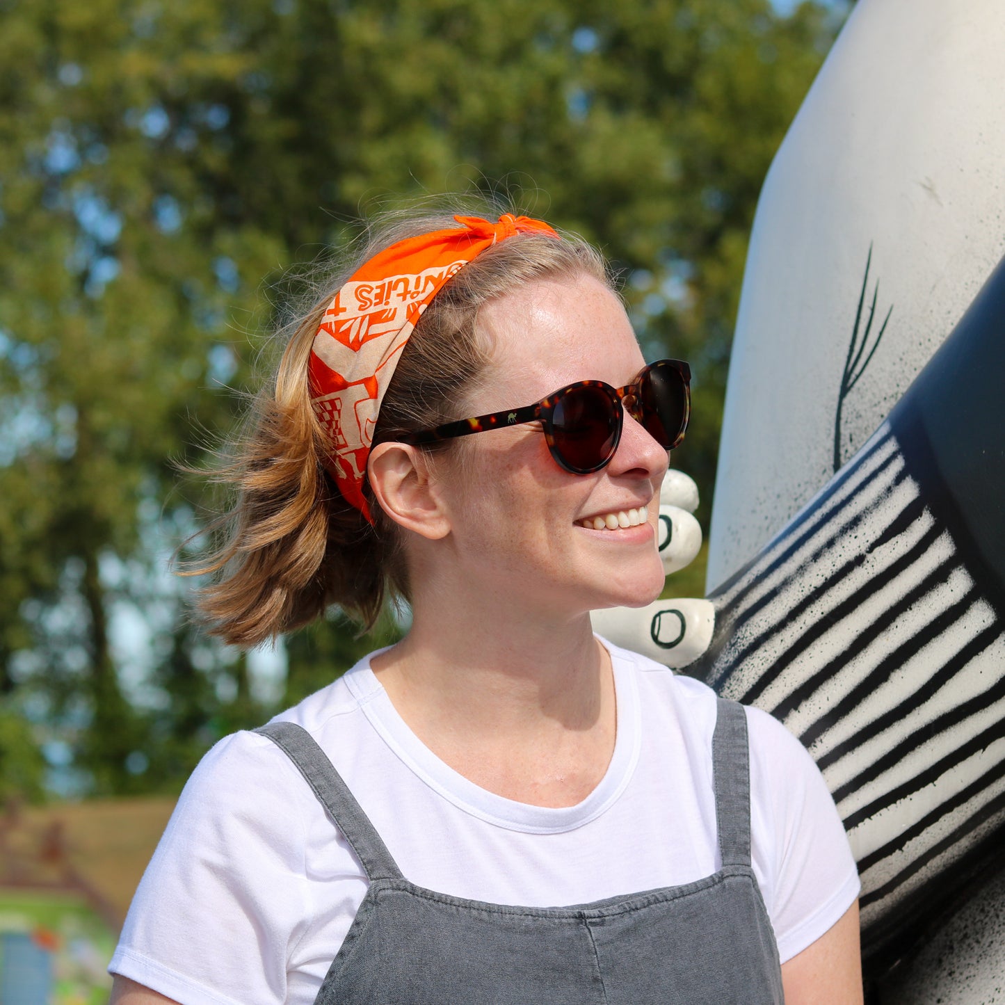 Woman with sunglasses and headband